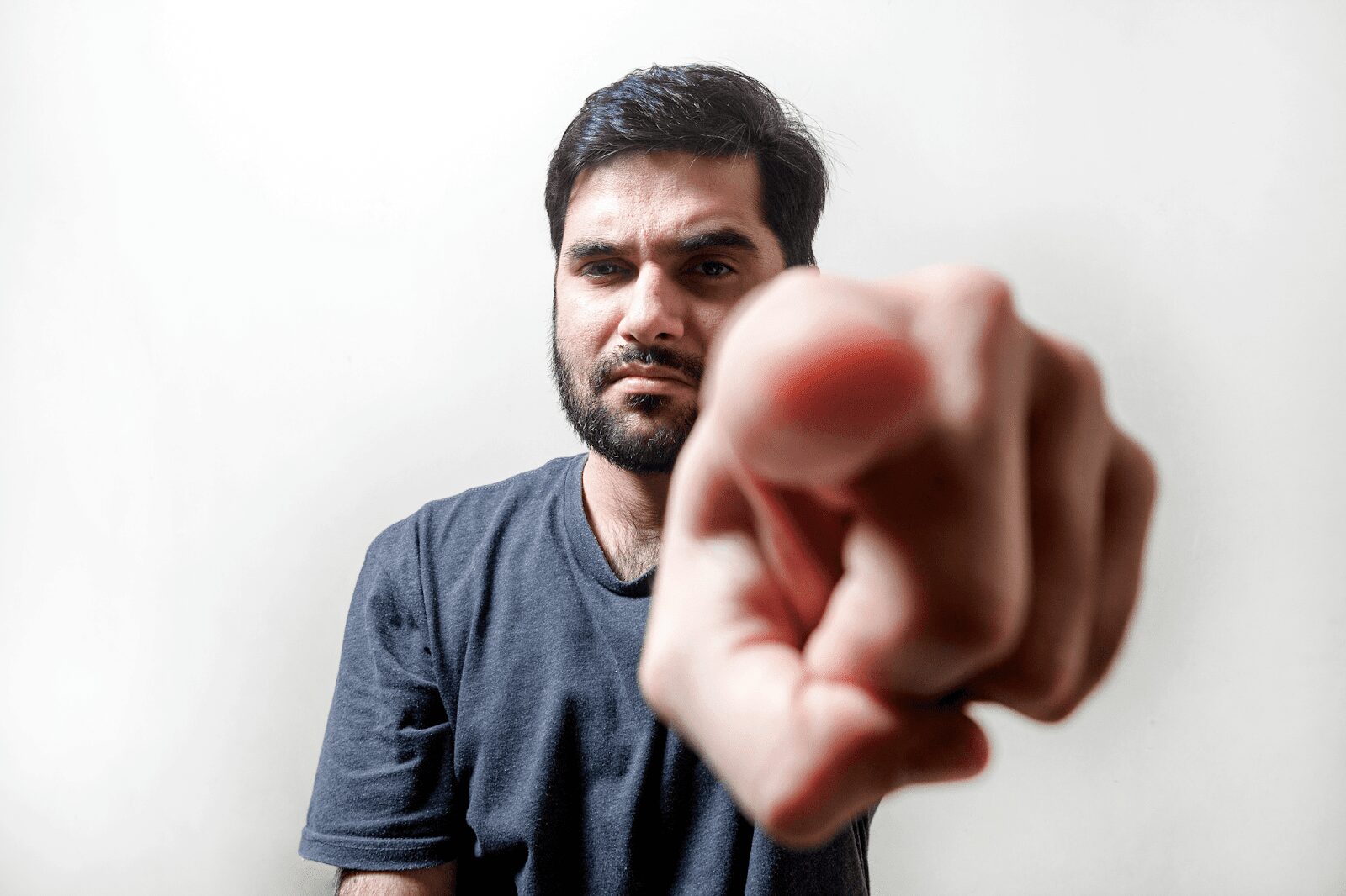 Man pointing at the camera with an accusatory expression, symbolizing the blame-shifting tactics of a narcissistic co-parent. Man pointing at the camera with an accusatory expression, symbolizing the blame-shifting tactics of a narcissistic co-parent.